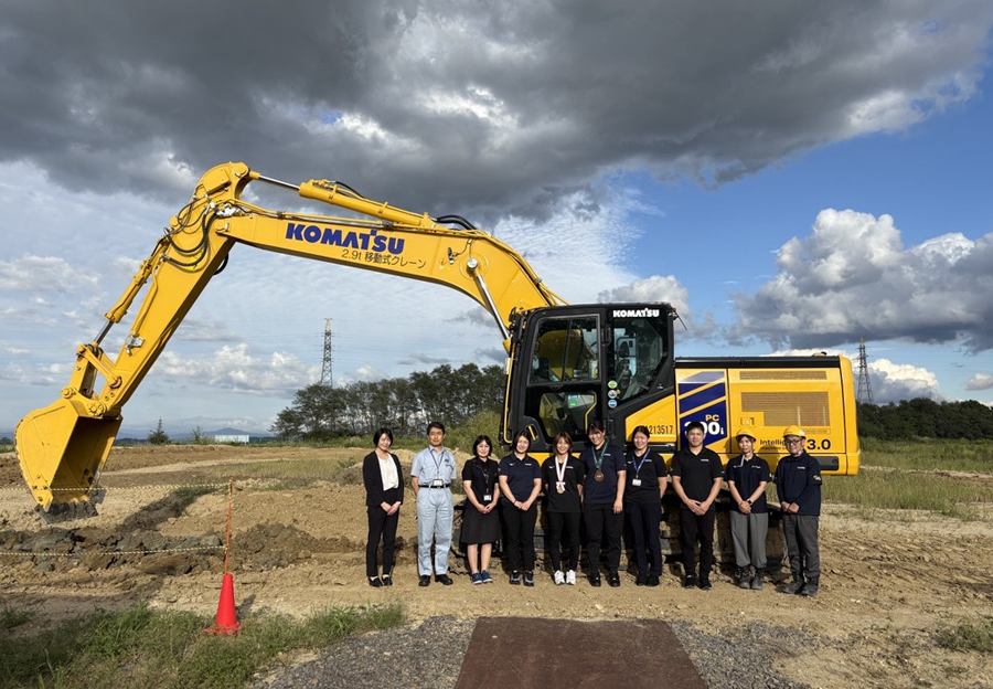 Construction equipment test ride during a visit to the Koriyama Plant